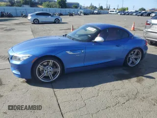 2016 BMW Z4 sDrive35is with VIN WBALM1C55GE634882, listed as a Copart auction lot 53873295 with 48,408 mi miles and Salvage Title. Bid and sale history available at carsss.com. Image 1.