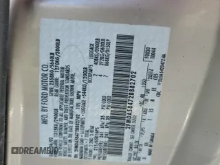 2002 Ford Windstar LTD z VIN 2FMDA58472BB82702, wystawiony jako Copart lot #77625364 z przebiegiem Nie podano mil oraz Szkoda całkowita • Salvage title. Historia ofert i sprzedaży dostępna na DreamBid. Obrazek 14.