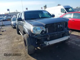 2012 Toyota Tacoma PreRunner with VIN 3TMKU4HN8CM032815, listed as a IAAI auction lot 41419499 with 261,448 mi miles and . Bid and sale history available at DreamBid. Image 1.