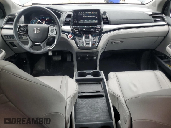 2023 Honda Odyssey Touring with VIN 5FNRL6H86PB024066, listed as a Copart auction lot 58414575 with 29,827 mi miles and Salvage title. Bid and sale history available at DreamBid. Image 8.