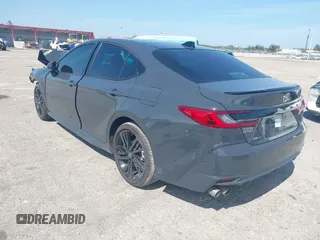 2025 Toyota Camry LE with VIN 4T1DAACK5SU076886, listed as a IAAI auction lot 41629641 with 9,919 mi miles and . Bid and sale history available at DreamBid. Image 3.