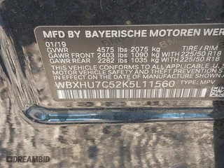 2019 BMW X1 sDrive28i with VIN WBXHU7C52K5L11560, listed as a IAAI auction lot 41354422 with 115,401 mi miles. Bid and sale history available at carsss.com. Image 9.