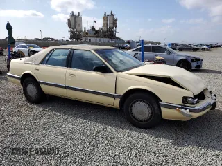 1992 Cadillac Seville z VIN 1G6KS53B0NU837105, wystawiony jako Copart lot #55865205 z przebiegiem 94 740 mil mil oraz Szkody całkowita. Historia ofert i sprzedaży dostępna na DreamBid. Obrazek 4.