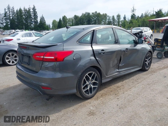 2015 Ford Focus SE with VIN 1FADP3F20FL269846, listed as a IAAI auction lot 42507197 with 143,496 mi miles and . Bid and sale history available at DreamBid. Image 4.