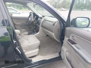 2008 Suzuki Grand Vitara Luxury z VIN JS3TD947X84100416, wystawiony jako IAAI lot #42362344 z przebiegiem 243 627 mil mil oraz . Historia ofert i sprzedaży dostępna na DreamBid. Obrazek 5.