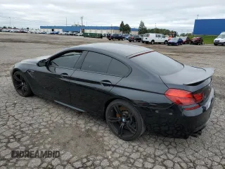 2015 BMW M6 z VIN WBS6C9C59FD467652, wystawiony jako Copart lot #66093293 z przebiegiem Nie podano mil oraz . Historia ofert i sprzedaży dostępna na DreamBid. Obrazek 2.