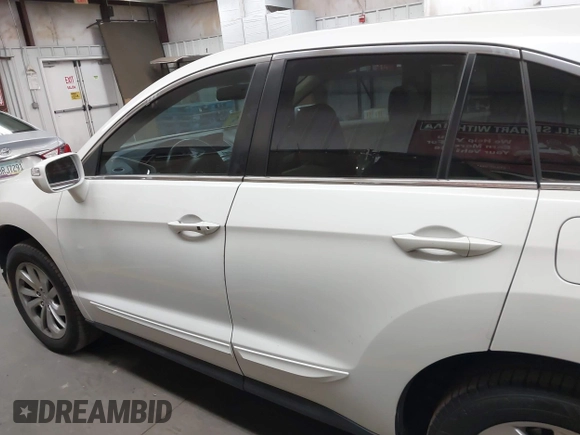 2018 Acura RDX with VIN 5J8TB3H38JL011983, listed as a IAAI auction lot 42385892 with 100,562 mi miles and . Bid and sale history available at DreamBid. Image 14.
