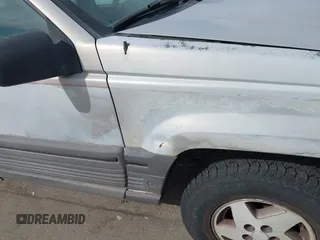 1994 Jeep Grand Cherokee Laredo with VIN 1J4GZ58YXRC325868, listed as a IAAI auction lot 42664900 with 220,149 mi miles and . Bid and sale history available at DreamBid. Image 6.