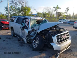 2020 GMC Yukon XL SLT z VIN 1GKS1GKC6LR238395, wystawiony jako IAAI lot #41522887 z przebiegiem Nie podano mil oraz . Historia ofert i sprzedaży dostępna na DreamBid. Obrazek 6.
