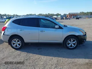 2009 Nissan Rogue SL with VIN JN8AS58T39W047497, listed as a IAAI auction lot 41792950 with 176,931 mi miles and . Bid and sale history available at DreamBid. Image 13.