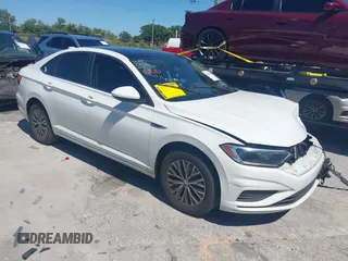 2019 Volkswagen Jetta SEL z VIN 3VWE57BU7KM102649, wystawiony jako IAAI lot #42049634 z przebiegiem 147 492 mil mil oraz . Historia ofert i sprzedaży dostępna na DreamBid. Obrazek 1.