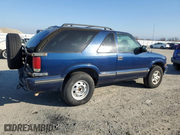 2000 Chevrolet Blazer LS z VIN 1GNCT18W8YK234090, wystawiony jako Copart lot #43063565 z przebiegiem 96 942 mil mil oraz Czysty tytuł • Clean title. Historia ofert i sprzedaży dostępna na DreamBid. Obrazek 3.