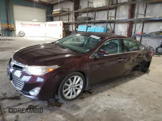 2013 Toyota Avalon XLE with VIN 4T1BK1EB6DU048521, listed as a Copart auction lot 61811125 with 124,468 mi miles and Salvage title. Bid and sale history available at DreamBid. Image 1.