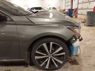 2019 Nissan Altima SR with VIN 1N4BL4CV6KC186522, listed as a IAAI auction lot 41773234 with 95,654 mi miles and . Bid and sale history available at DreamBid. Image 19.