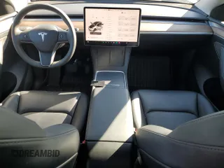 2024 Tesla Model Y with VIN 7SAYGDED9RF094494, listed as a Copart auction lot 50298115 with 7,858 mi miles and Salvage Title. Bid and sale history available at DreamBid. Image 8.
