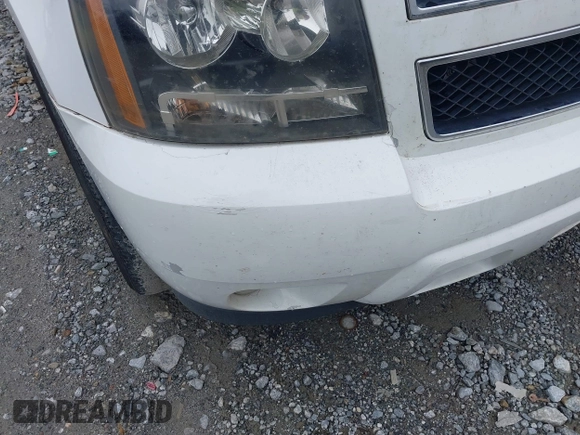 2007 Chevrolet Tahoe LT with VIN 1GNFC13007R415013, listed as a IAAI auction lot 42370633 with 302,992 mi miles and . Bid and sale history available at DreamBid. Image 14.