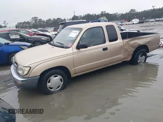 1999 Toyota Tacoma with VIN 4TAVL52N4XZ524059, listed as a IAAI auction lot 41761806 with 214,425 mi miles and . Bid and sale history available at DreamBid. Image 2.