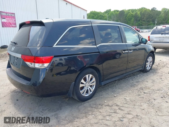 2014 Honda Odyssey EX-L with VIN 5FNRL5H66EB062158, listed as a IAAI auction lot 42072020 with 211,278 mi miles and . Bid and sale history available at carsss.com. Image 4.