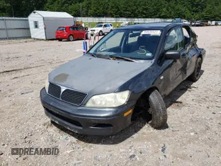 2002 Mitsubishi Lancer LS with VIN JA3AJ36EX2U002399, listed as a Copart auction lot 54435531 with 106,937 mi miles and Salvage Title. Bid and sale history available at carsss.com. Image 2.