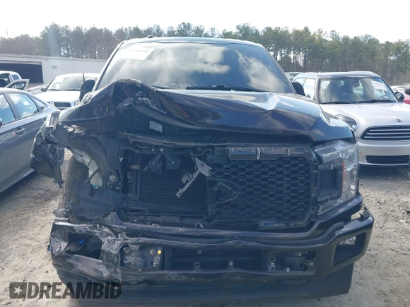 2018 Ford F-150 XL with VIN 1FTEW1CP0JFE36641, listed as a IAAI auction lot 41445055 with 137,569 mi miles and . Bid and sale history available at DreamBid. Image 12.