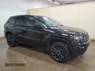 2021 Jeep Grand Cherokee Laredo X with VIN 1C4RJFAG0MC535661, listed as a Copart auction lot 57431135 with 101,314 mi miles and Salvage title. Bid and sale history available at DreamBid. Image 4.