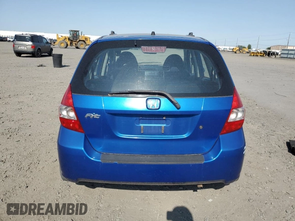 2007 Honda Fit with VIN JHMGD37407S044719, listed as a Copart auction lot 59192715 with 275,955 mi miles and Clean title. Bid and sale history available at DreamBid. Image 6.