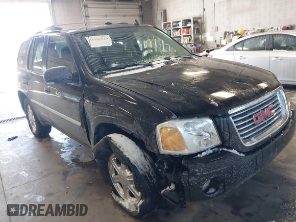 2007 GMC Envoy SLE with VIN 1GKDT13S472123167, listed as a IAAI auction lot 41385620 with 157,680 mi miles. Bid and sale history available at carsss.com. Image 1.