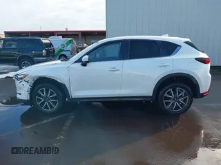 2018 Mazda CX-5 Touring with VIN JM3KFACM1J1431462, listed as a IAAI auction lot 41038099 with 77,489 mi miles. Bid and sale history available at carsss.com. Image 14.