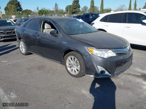 2014 Toyota Camry Hybrid LE with VIN 4T1BD1FK5EU106743, listed as a IAAI auction lot 41323019 with 84,511 mi miles. Bid and sale history available at carsss.com. Image 1.