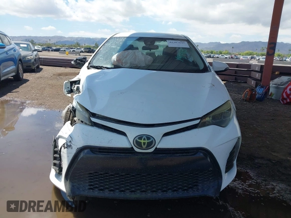 2017 Toyota Corolla L with VIN 2T1BURHE8HC814965, listed as a IAAI auction lot 42387645 with 230,303 mi miles and . Bid and sale history available at DreamBid. Image 12.