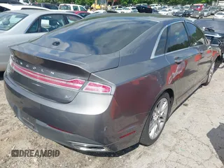2014 Lincoln MKZ with VIN 3LN6L2GK3ER804770, listed as a IAAI auction lot 42127057 with 147,623 mi miles and . Bid and sale history available at DreamBid. Image 4.