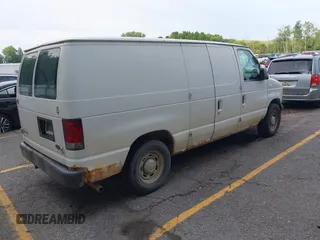 2006 Ford Econoline Cargo with VIN 1FTRE14W26HA13663, listed as a IAAI auction lot 42844289 with 153,510 mi miles and . Bid and sale history available at DreamBid. Image 4.