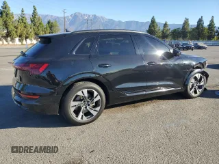 2022 Audi e-tron Premium with VIN WA1AAAGE0NB028153, listed as a Copart auction lot 68147894 with 28,256 mi miles and Salvage Title. Bid and sale history available at DreamBid. Image 3.