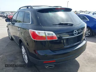 2011 Mazda CX-9 Grand Touring with VIN JM3TB3DA5B0300784, listed as a IAAI auction lot 41816110 with 138,523 mi miles and . Bid and sale history available at DreamBid. Image 3.