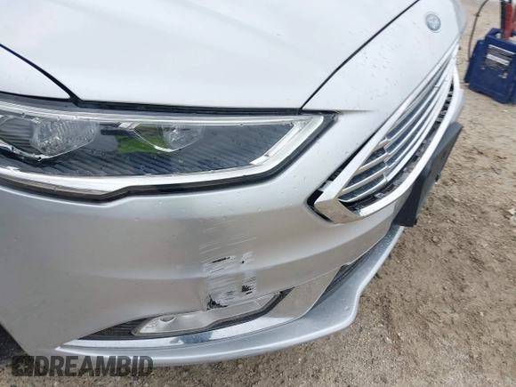 2017 Ford Fusion SE z VIN 3FA6P0HD5HR166433, wystawiony jako IAAI lot #42394998 z przebiegiem 121 333 mil mil oraz . Historia ofert i sprzedaży dostępna na DreamBid. Obrazek 18.