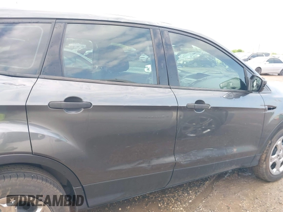 2017 Ford Escape S z VIN 1FMCU0F70HUC24455, wystawiony jako IAAI lot #42093457 z przebiegiem 144 049 mil mil oraz . Historia ofert i sprzedaży dostępna na DreamBid. Obrazek 13.