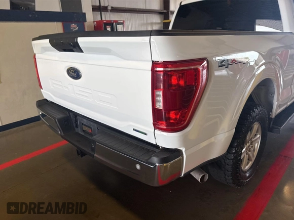 2021 Ford F-150 XL with VIN 1FTFX1E51MKF07502, listed as a IAAI auction lot 42737762 with 90,272 mi miles and . Bid and sale history available at DreamBid. Image 21.