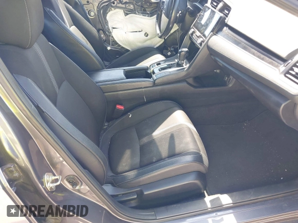 2019 Honda Civic Sport with VIN 19XFC2F89KE019683, listed as a IAAI auction lot 42055871 with 107,941 mi miles and . Bid and sale history available at DreamBid. Image 5.