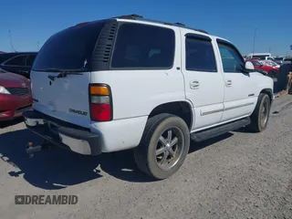 2002 Chevrolet Tahoe LS with VIN 1GNEC13Z32R148792, listed as a IAAI auction lot 38599251 with 333,537 mi miles and . Bid and sale history available at DreamBid. Image 4.