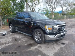 2021 Ford F-150 XL with VIN 1FTEW1CP7MKD20266, listed as a IAAI auction lot 41618910 with 80,194 mi miles. Bid and sale history available at carsss.com. Image 1.