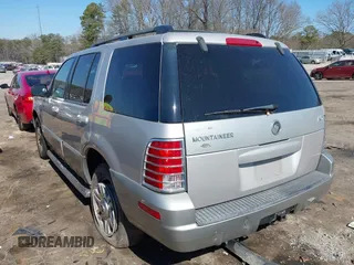 2003 Mercury Mountaineer Convenience z VIN 4M2ZU86K73UJ14054, wystawiony jako IAAI lot #41649332 z przebiegiem 210 772 mil mil oraz . Historia ofert i sprzedaży dostępna na DreamBid. Obrazek 3.