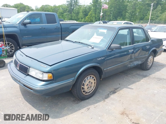 1994 Oldsmobile Cutlass Ciera S z VIN 1G3AG55M3R6441530, wystawiony jako IAAI lot #42404529 z przebiegiem 78 518 mil mil oraz . Historia ofert i sprzedaży dostępna na DreamBid. Obrazek 2.