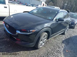 2023 Mazda CX-30 2.5 S Premium Package with VIN 3MVDMBDM7PM528297, listed as a IAAI auction lot 41637542 with 48,935 mi miles. Bid and sale history available at carsss.com. Image 17.