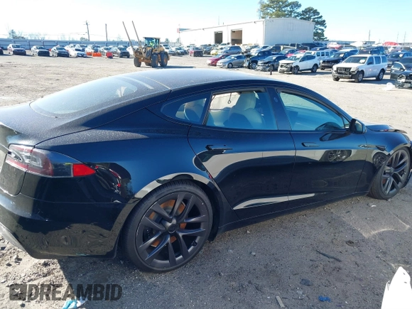 2021 Tesla Model S Long Range z VIN 5YJSA1E50MF438864, wystawiony jako IAAI lot #41190778 z przebiegiem Nie podano mil oraz . Historia ofert i sprzedaży dostępna na DreamBid. Obrazek 14.