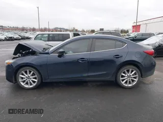 2017 Mazda 3 Touring with VIN 3MZBN1V72HM103660, listed as a IAAI auction lot 41588084 with 95,184 mi miles and . Bid and sale history available at DreamBid. Image 13.