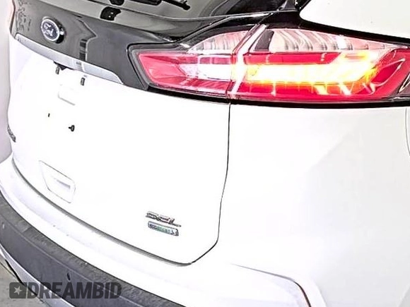 2019 Ford Edge SEL with VIN 2FMPK3J9XKBC37759, listed as a IAAI auction lot 42666643 with 103,812 mi miles and . Bid and sale history available at DreamBid. Image 21.