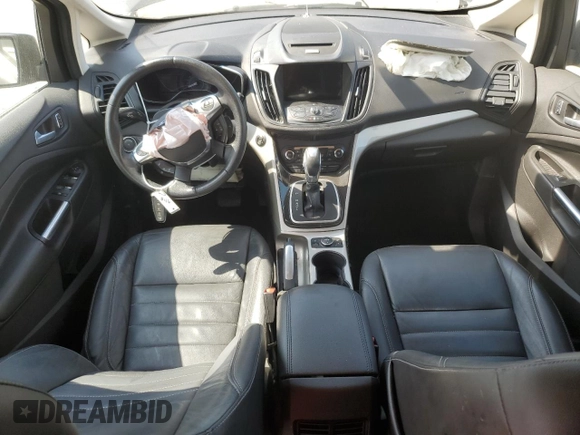 2016 Ford C-Max Energi SEL with VIN 1FADP5CU0GL101658, listed as a Copart auction lot 68214393 with 66,390 mi miles. Bid and sale history available at carsss.com. Image 8.