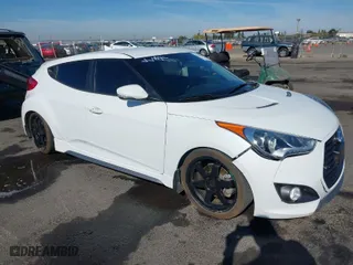2014 Hyundai Veloster Turbo with VIN KMHTC6AE5EU201714, listed as a IAAI auction lot 40671069 with 151,901 mi miles. Bid and sale history available at carsss.com. Image 6.