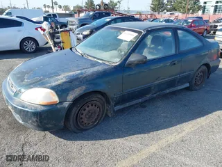 1997 Honda Civic DX with VIN 1HGEJ622XVL073128, listed as a IAAI auction lot 41721903 with 177,616 mi miles. Bid and sale history available at carsss.com. Image 2.