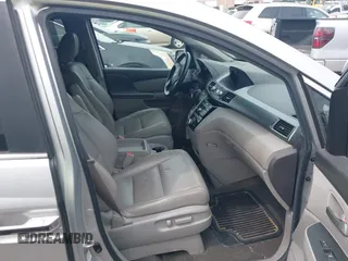 2012 Honda Odyssey EX-L with VIN 5FNRL5H66CB081323, listed as a IAAI auction lot 42465110 with 266,934 mi miles and . Bid and sale history available at DreamBid. Image 5.